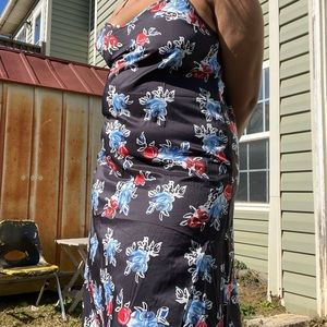 Hello! I am selling a dark blue with blue and red roses.